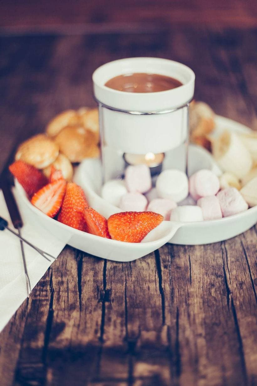 Chocolate fondue with strawberries and marshmallows